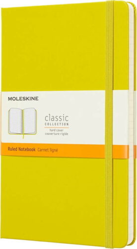 Žlutý linkovaný zápisník v pevné vazbě Moleskine